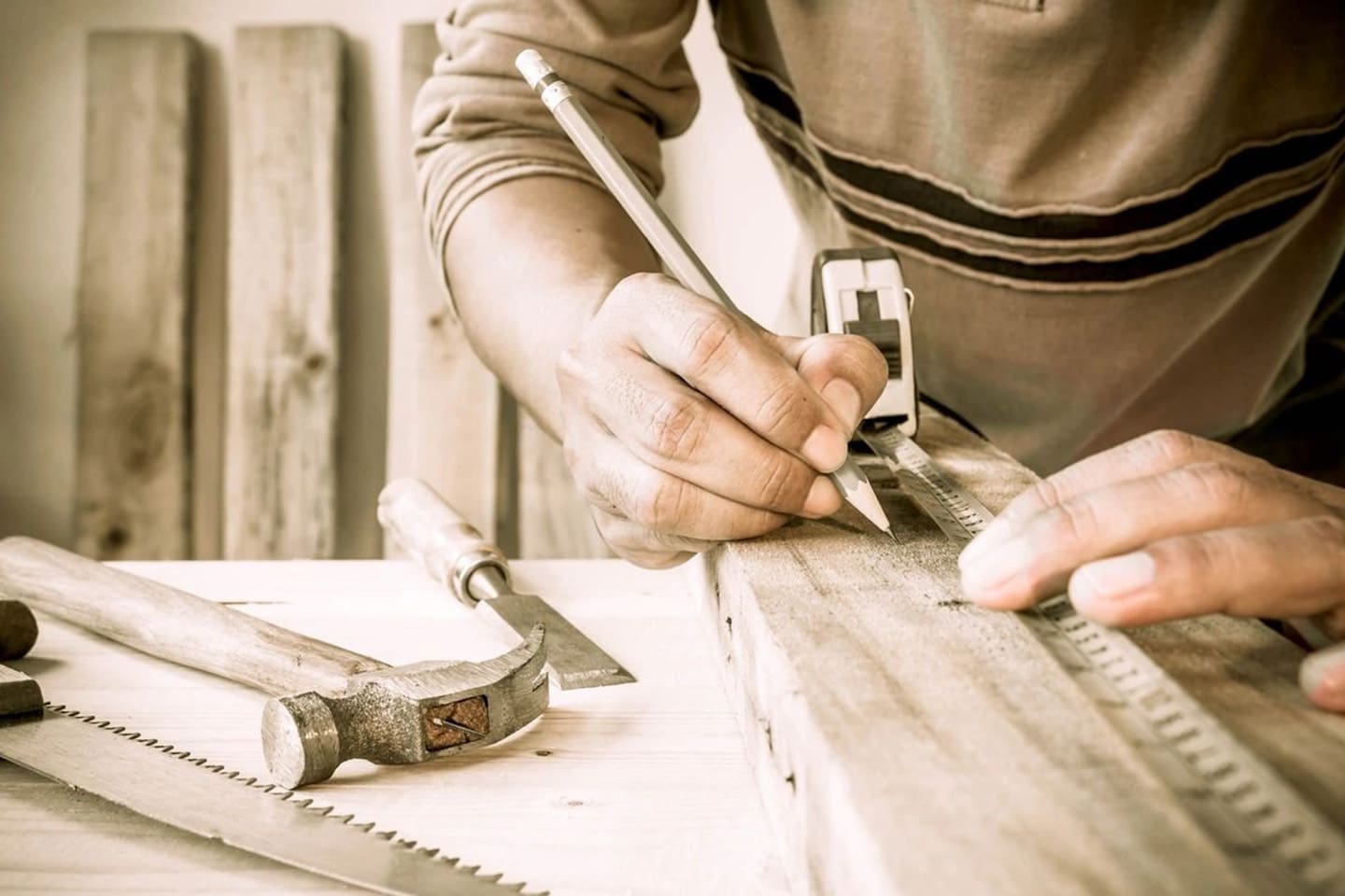 A person working on something with some kind of tool